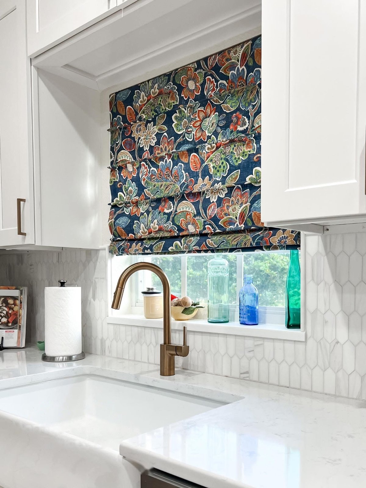 Kitchen renovation in Lake Wales, FL with apron-front farmhouse sink, brass gooseneck faucet, and picket tile backsplash