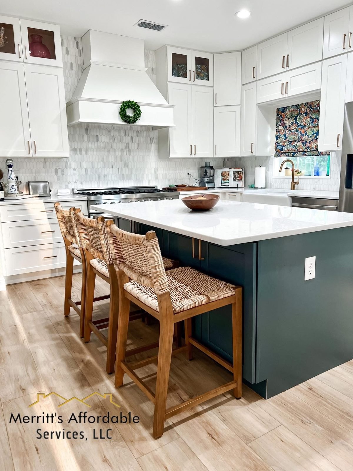 Kitchen remodel in Winter Haven, FL with white shaker cabinets, green island, custom range hood, and picket tile backsplash