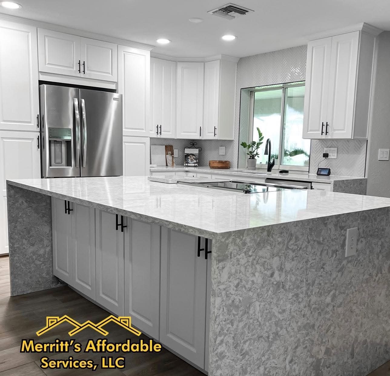 Modern kitchen with waterfall quartz island in Polk County, FL