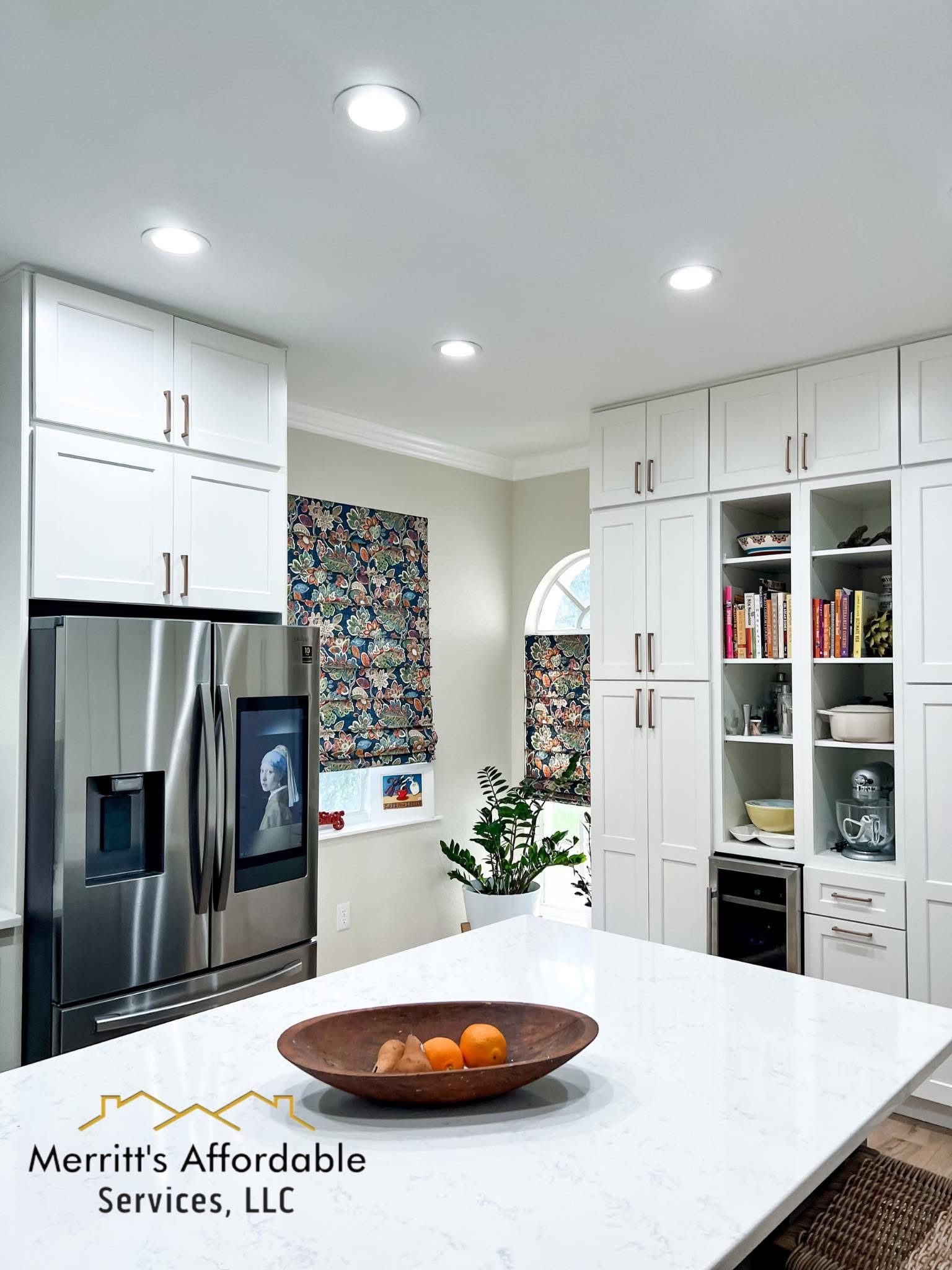 Kitchen remodel with full pantry wall — white shaker cabinets, open shelving, quartz island, recessed lighting
